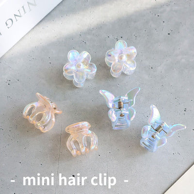 Still very popular! We have a large number of mini hair clips in stock.